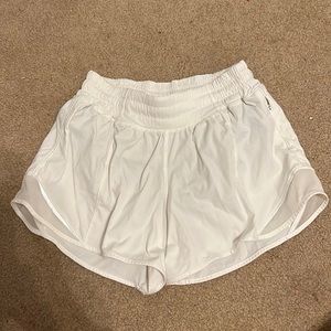 Great condition. White LULULEMON hotty hot 4 in. LR shorts.